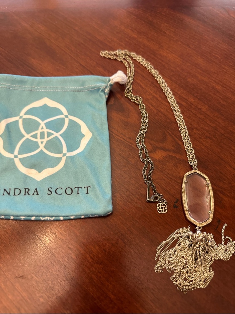 Kendra Scott Pink Stone Tassel Pendant Necklace in Gold with clear stone